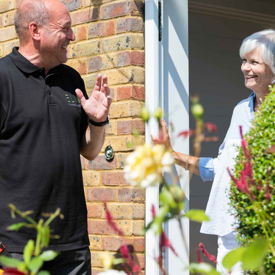 A lady being greeted by her Estate Manager