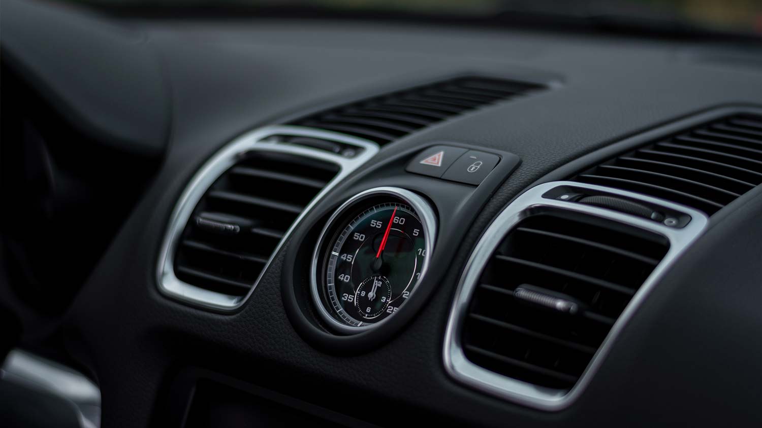 A photo of a car's air conditioning vent