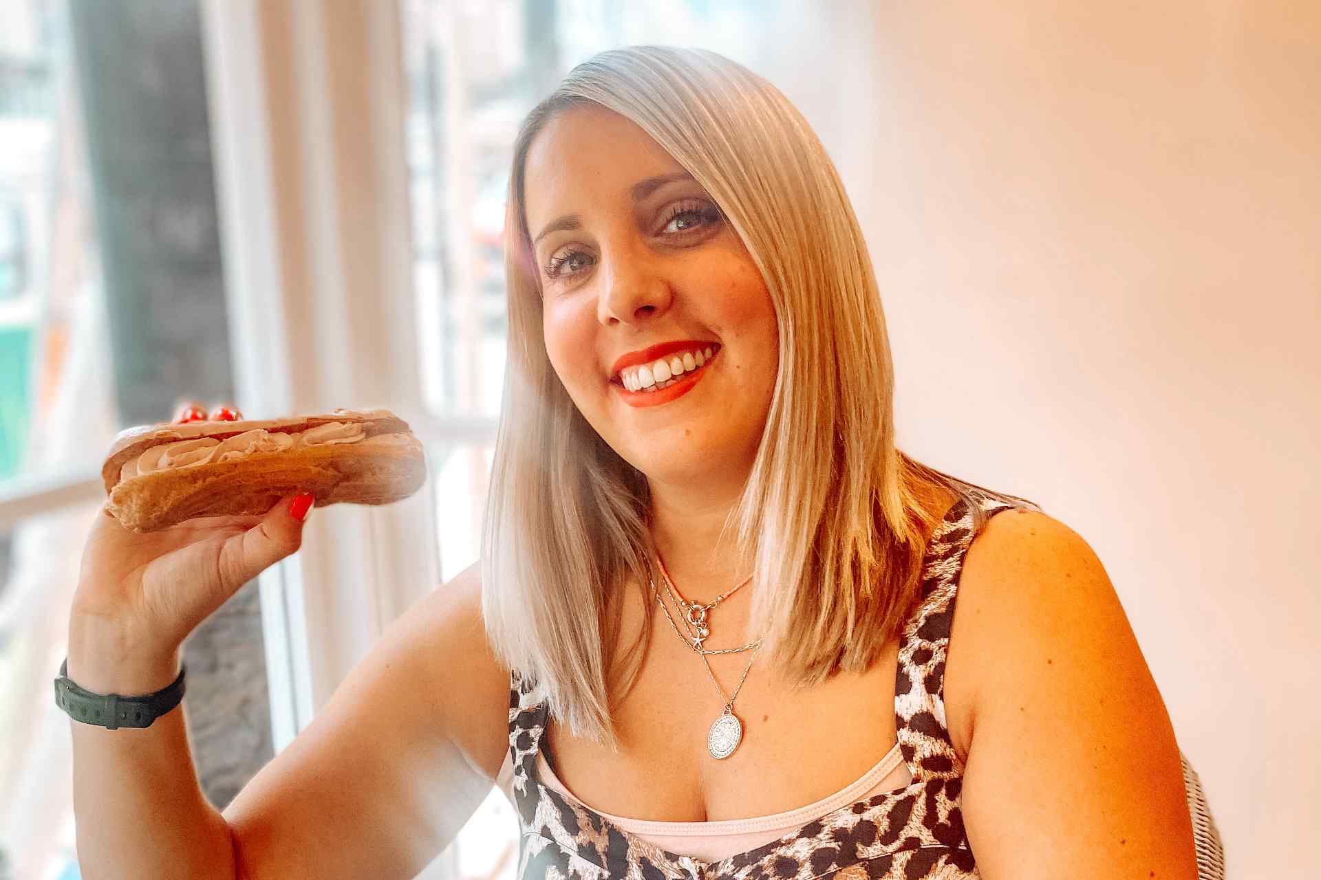 Oxfordshire Foodie eating a choux cake