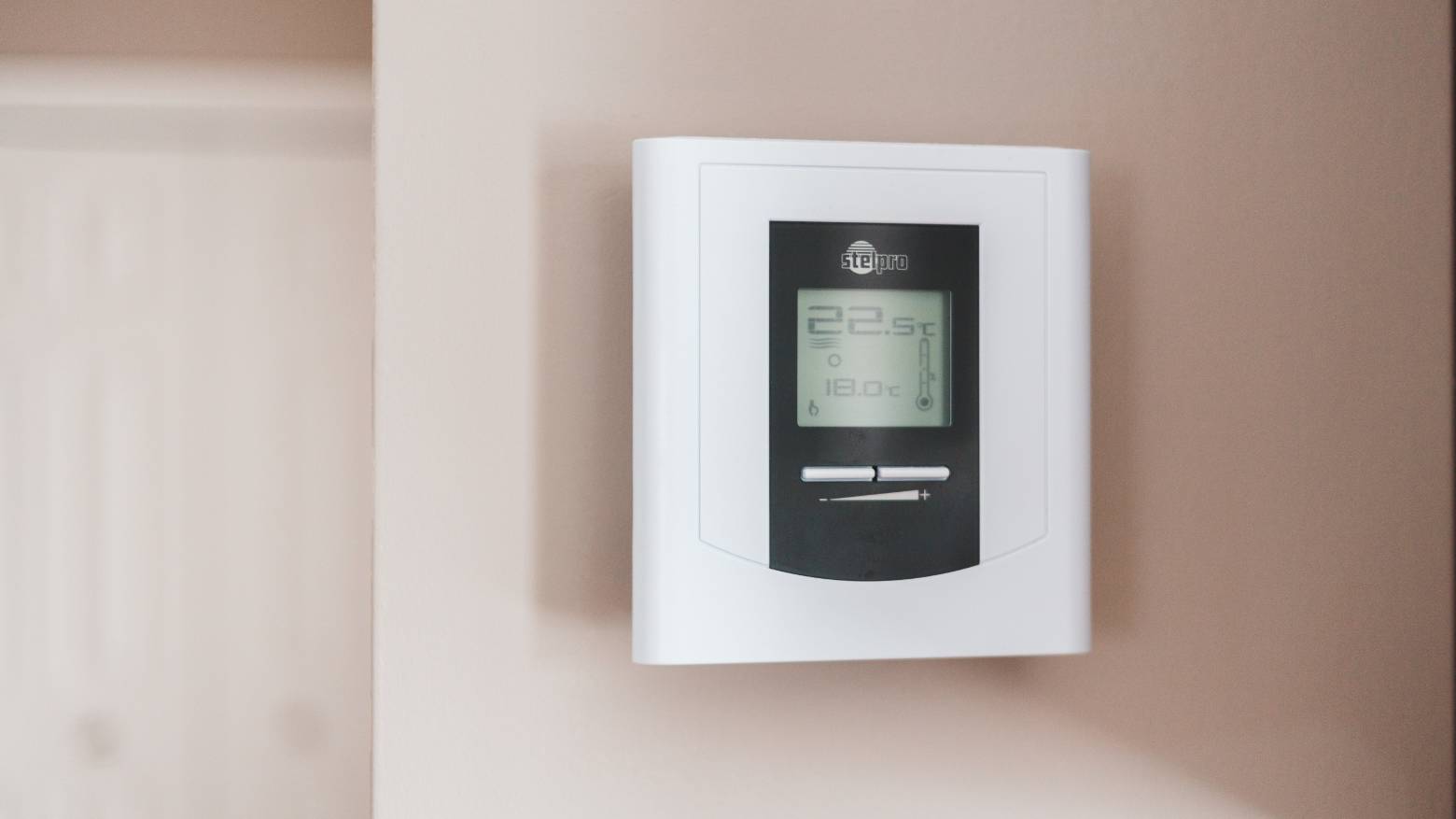 A temperature gauge in a wall