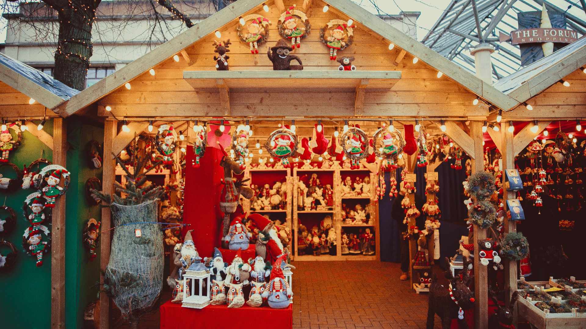 Christmas market stall selling decorations.
