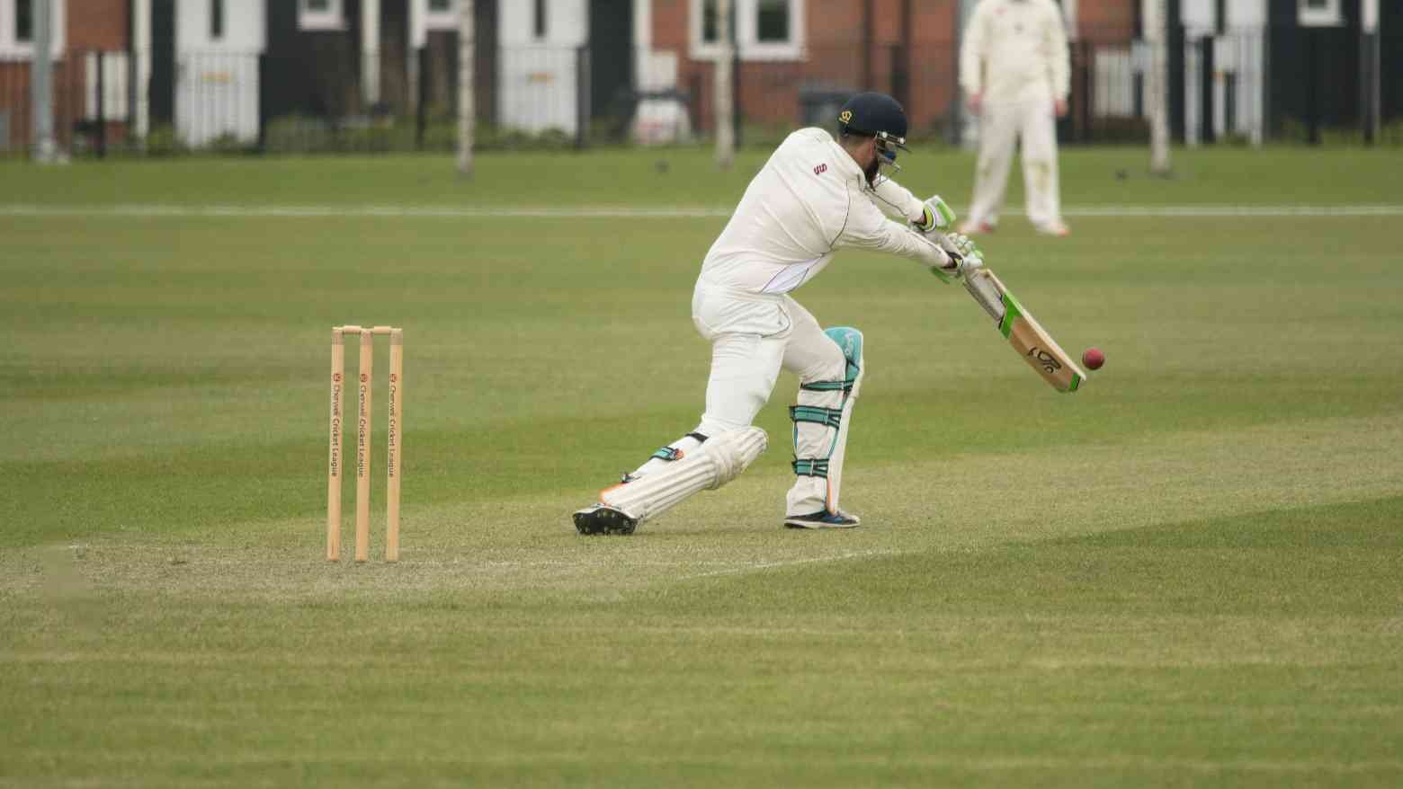 Someone playing cricket