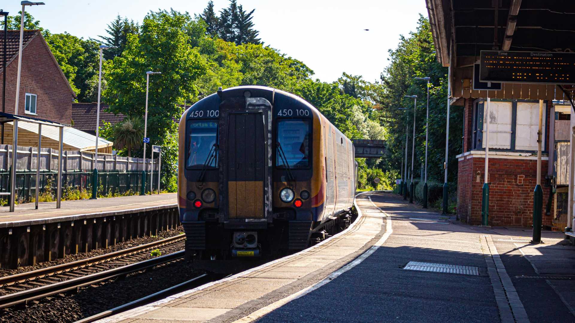 A train pulling into a local station