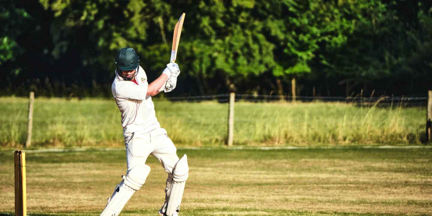 A man playing cricket