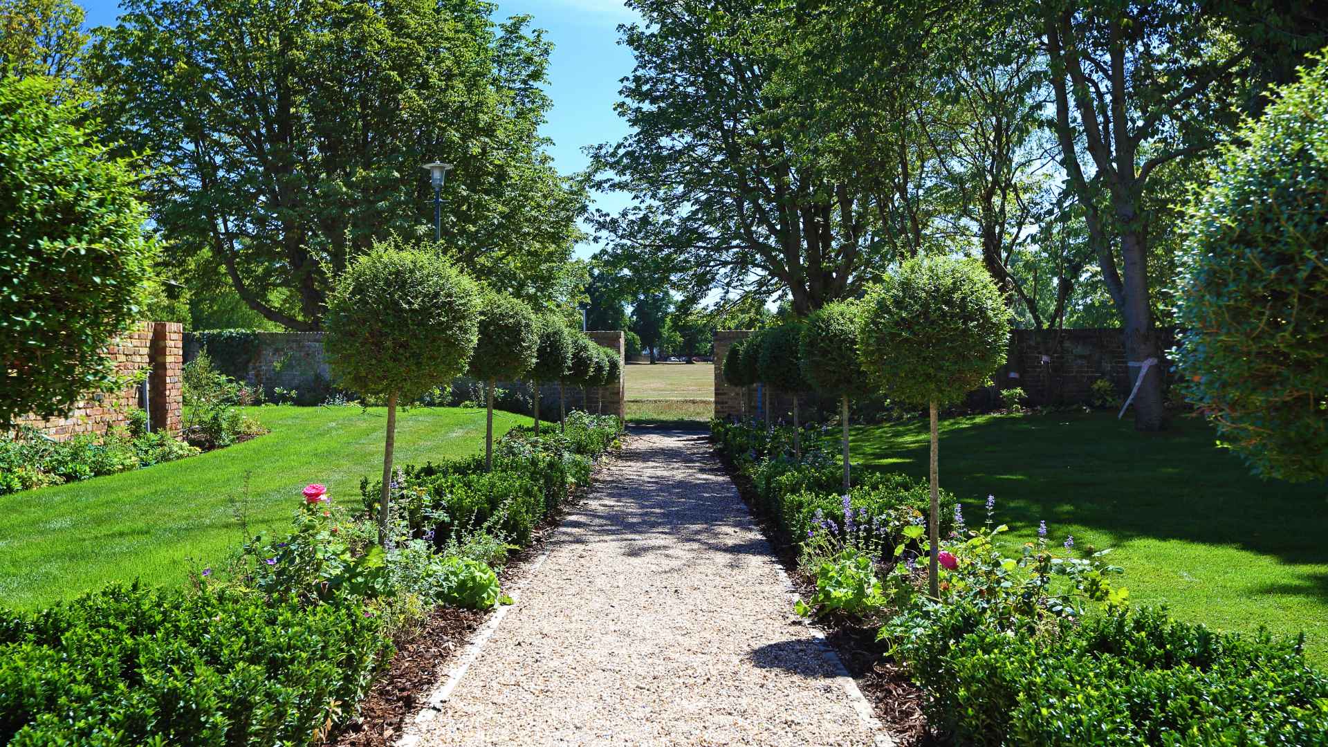 A foliage lined pathway at Orford Place, Ham Common