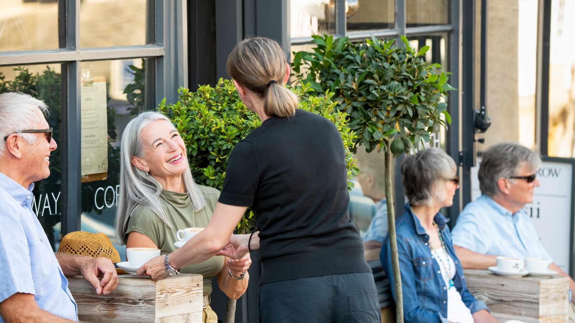 Someone being served coffee