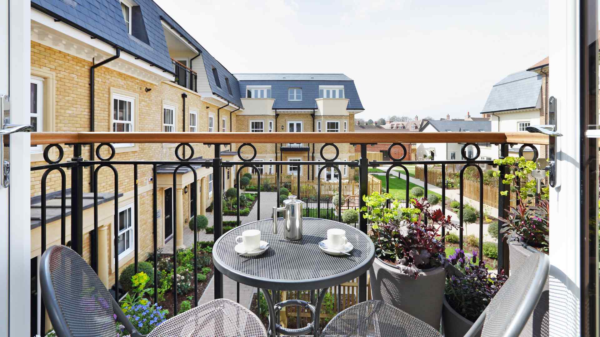 A balcony garden with potted plants