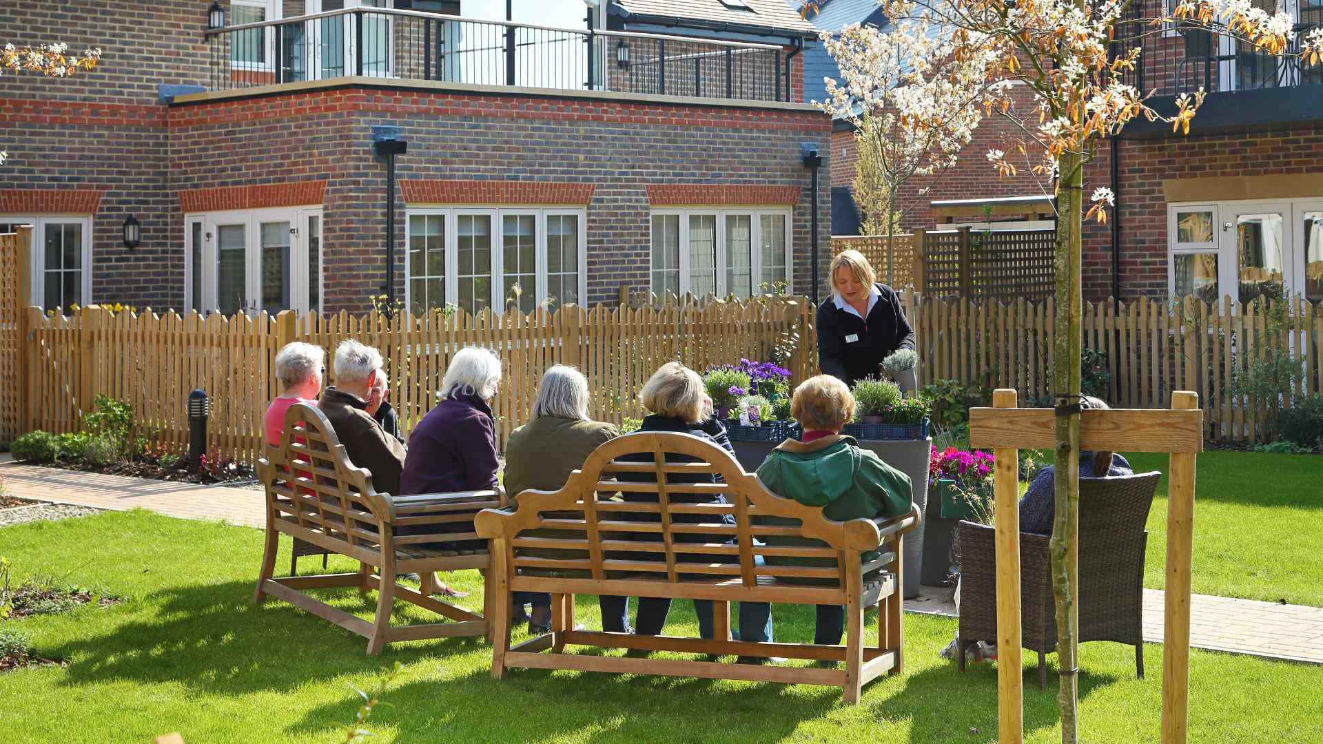A plant potting workshop taking place outdoors