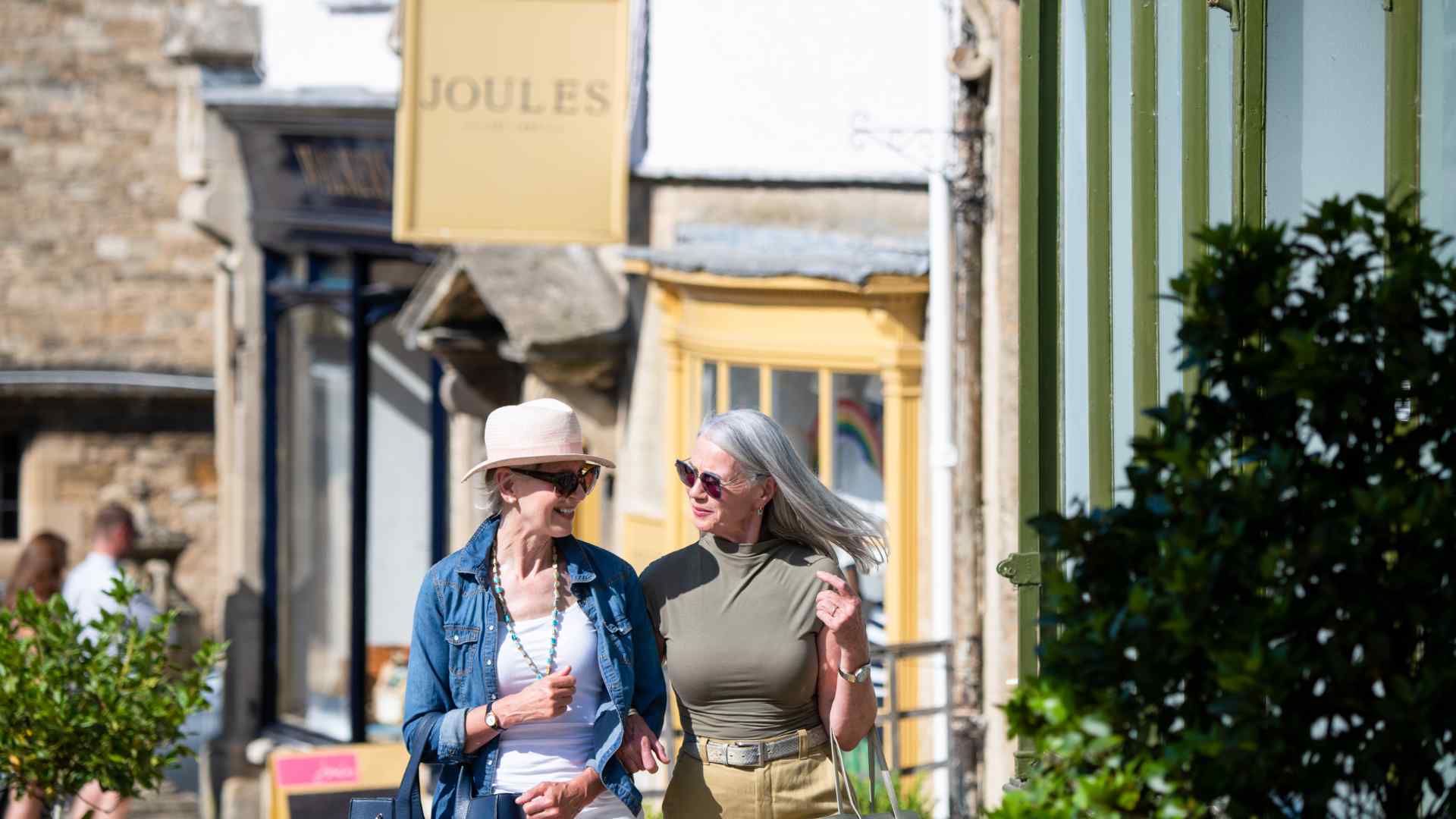 Two ladies walking down the street in Burford