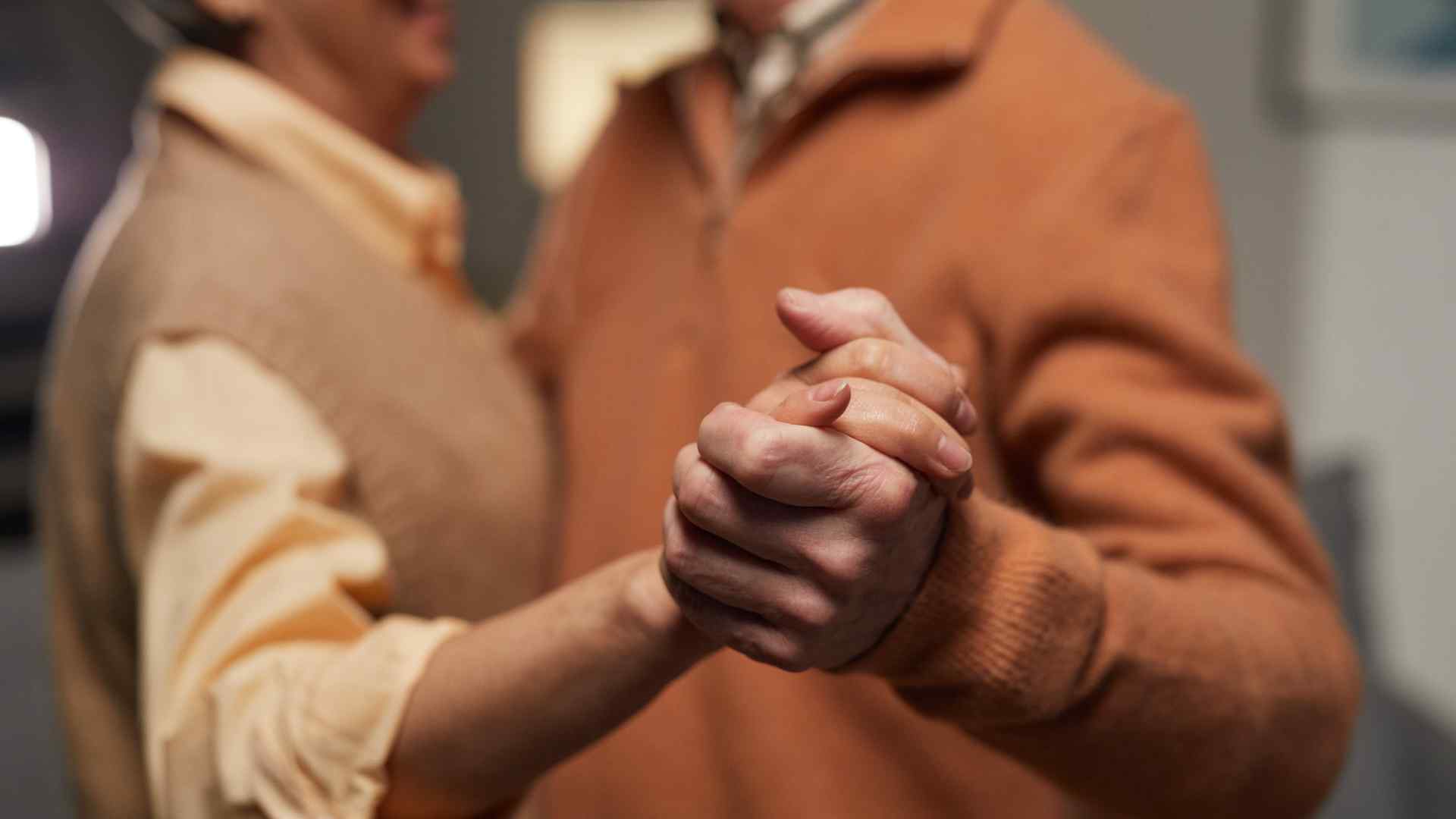 A close up of two people dancing