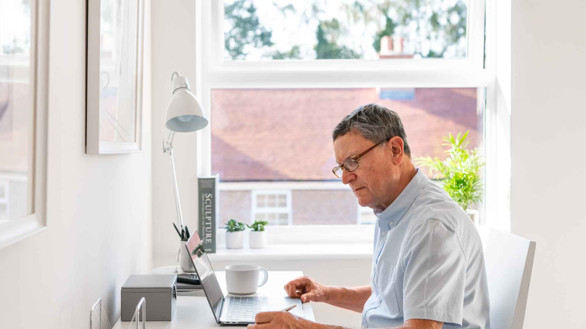 A man using a laptop computer