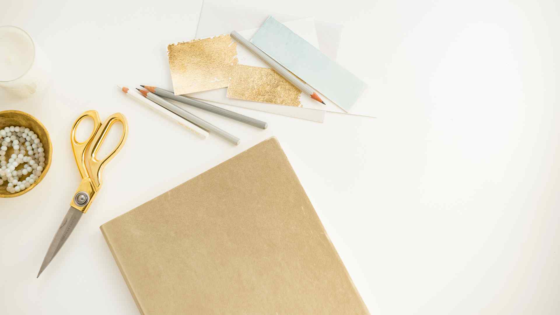 Paper, scissors and pencils ready for crafting