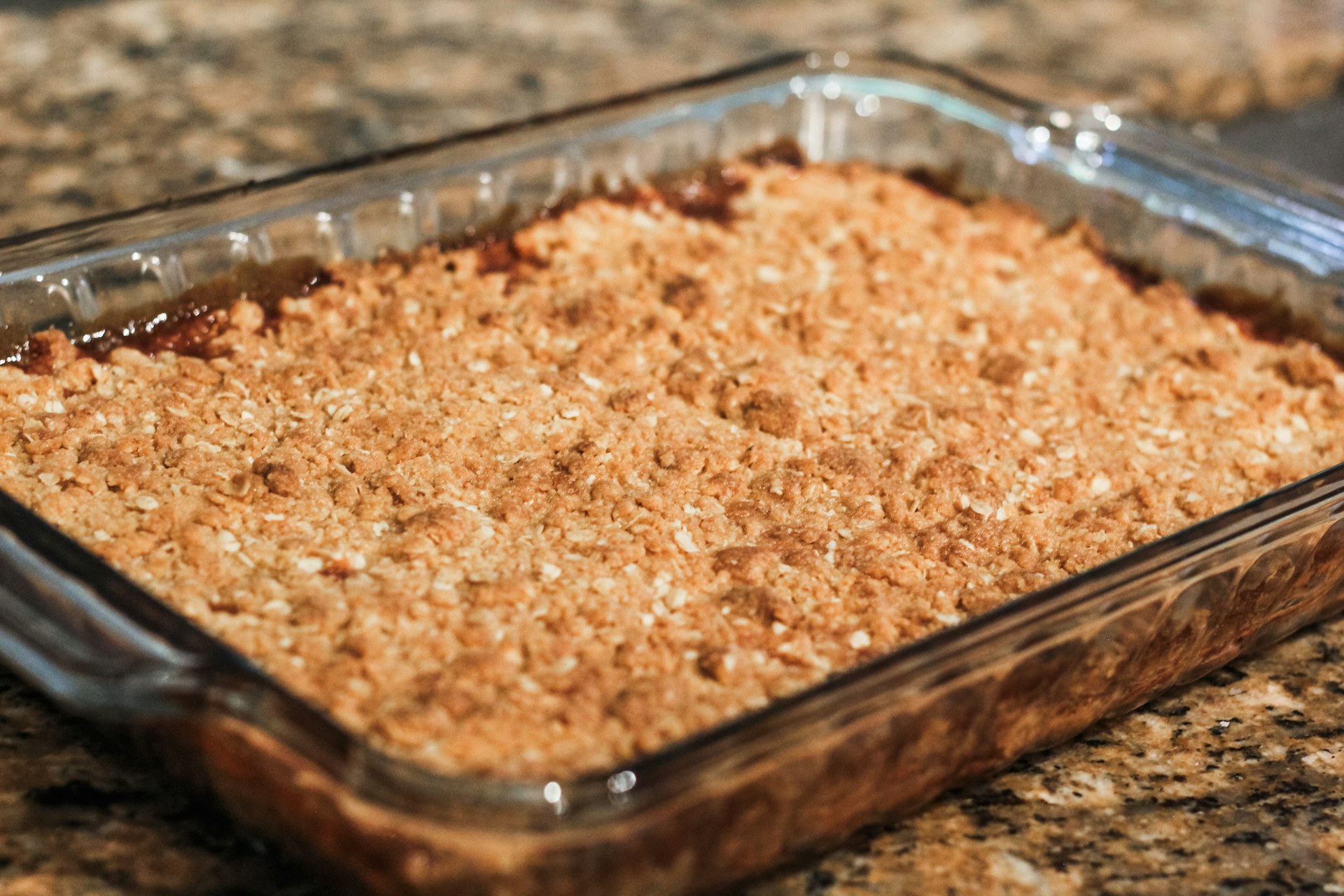 Golden homemade apple crumble in a baking dish